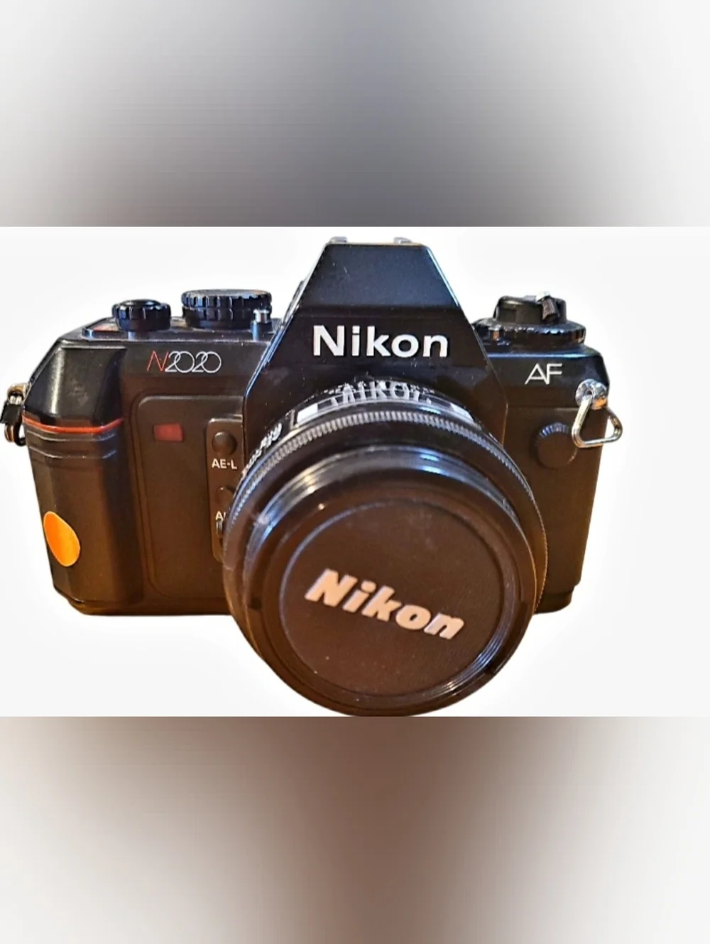 Nikon N2020 AF Film CAMERA, LEATHER CASE + HAZE LENS